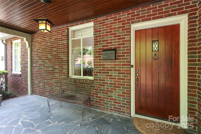 1021 Isleworth Ave, Charlotte, NC 28203 - entrance to property with brick siding and a porch