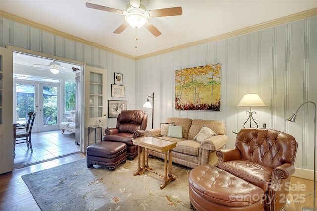 1021 Isleworth Ave, Charlotte, NC 28203 - living area with a ceiling fan, ornamental molding, wood finished floors, and french doors