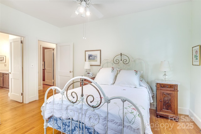 1021 Isleworth Ave, Charlotte, NC 28203 - bedroom featuring light wood-style floors, baseboards, and ceiling fan