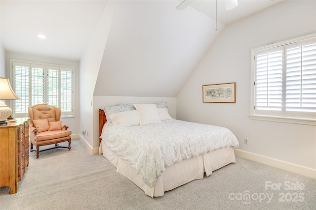 1021 Isleworth Ave, Charlotte, NC 28203 - carpeted bedroom featuring multiple windows, lofted ceiling, baseboards, recessed lighting, and ceiling fan