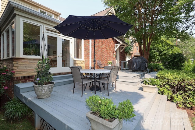 1021 Isleworth Ave, Charlotte, NC 28203 - deck featuring french doors, outdoor dining area, and grilling area