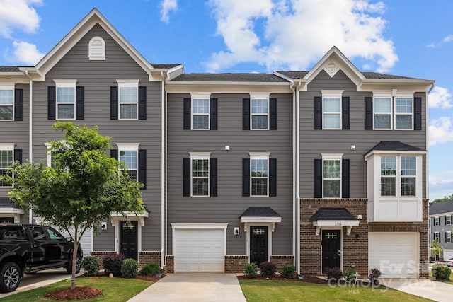 3108 Beeler Ln, Charlotte, NC 28208 - multi unit property with concrete driveway, brick siding, and a garage
