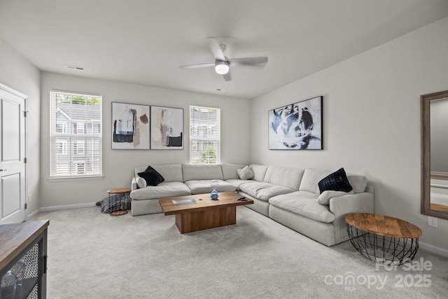 3108 Beeler Ln, Charlotte, NC 28208 - carpeted living room with baseboards and a ceiling fan