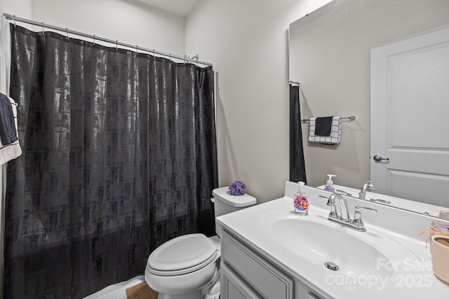 3108 Beeler Ln, Charlotte, NC 28208 - bathroom featuring vanity, toilet, and curtained shower