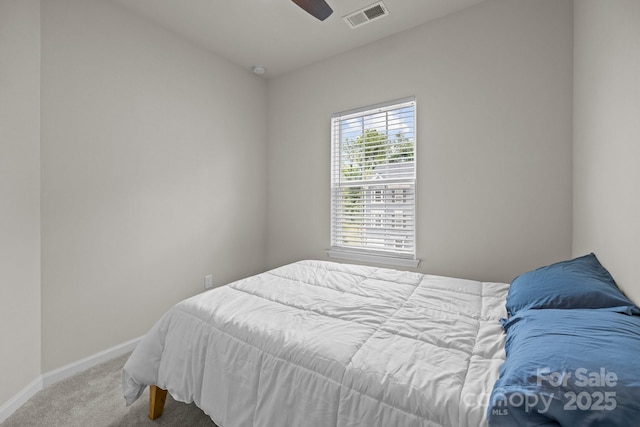 3108 Beeler Ln, Charlotte, NC 28208 - carpeted bedroom featuring baseboards and a ceiling fan