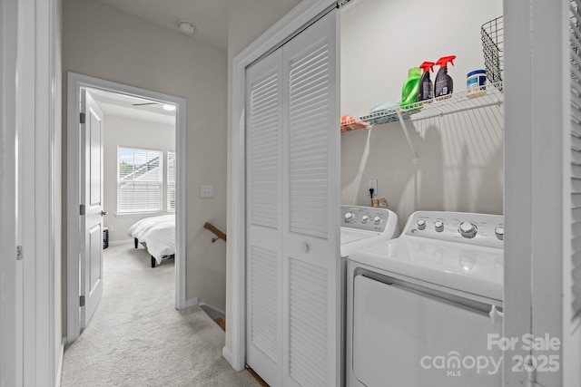 3108 Beeler Ln, Charlotte, NC 28208 - laundry room featuring washing machine and clothes dryer, light colored carpet, and baseboards