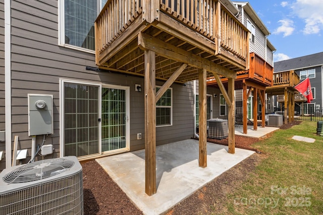 3108 Beeler Ln, Charlotte, NC 28208 - view of patio with central air condition unit and a deck