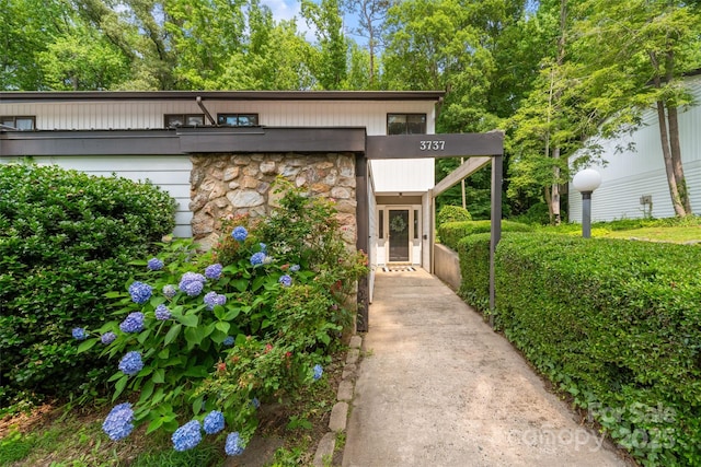 3737 Winding Creek Ln, Charlotte, NC 28226 - view of exterior entry with stone siding