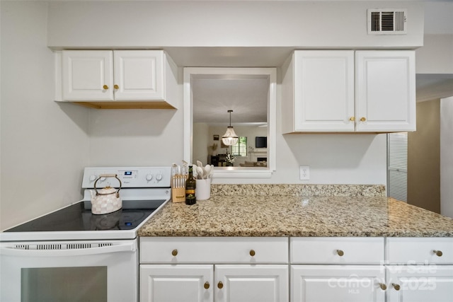 3737 Winding Creek Ln, Charlotte, NC 28226 - kitchen featuring white electric range oven, white cabinets, and light stone countertops