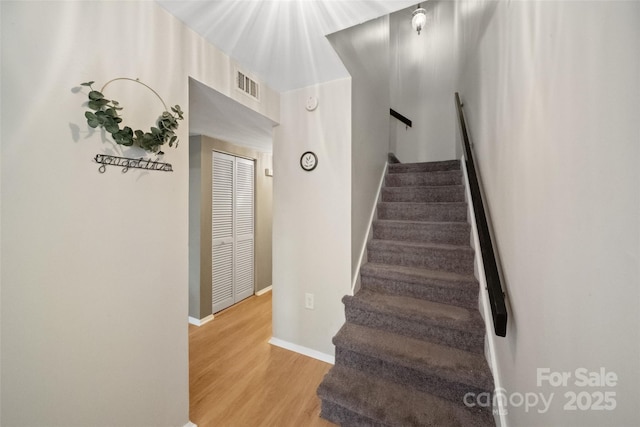 3737 Winding Creek Ln, Charlotte, NC 28226 - staircase featuring wood finished floors and baseboards