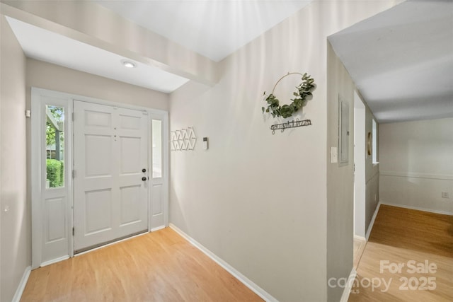 3737 Winding Creek Ln, Charlotte, NC 28226 - foyer entrance with light wood-style floors, baseboards, and electric panel
