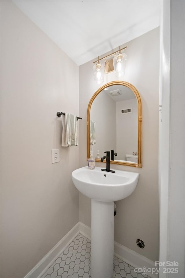 3737 Winding Creek Ln, Charlotte, NC 28226 - bathroom featuring tile patterned flooring and baseboards
