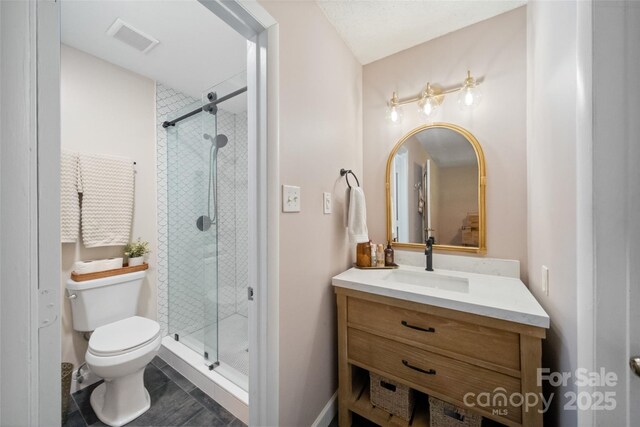 3737 Winding Creek Ln, Charlotte, NC 28226 - bathroom with toilet, vanity, and a shower stall