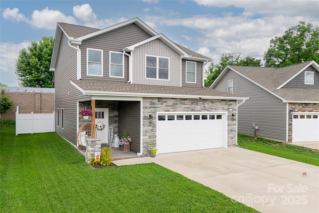 27 Sage Crest Loop, Weaverville, NC 28787 - craftsman-style house featuring concrete driveway, stone siding, and board and batten siding