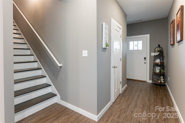 27 Sage Crest Loop, Weaverville, NC 28787 - entrance foyer featuring wood finished floors, baseboards, and stairs