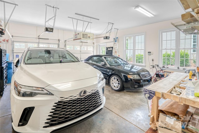 12910 Meetinghouse Dr, Cornelius, NC 28031 - garage featuring a garage door opener
