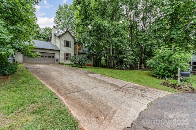 3884 Snider Cir, Hickory, NC 28602 - traditional-style house featuring concrete driveway, a garage, a chimney, and roof with shingles