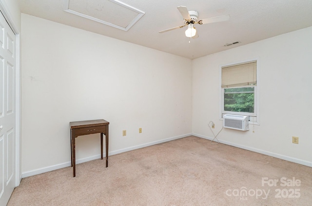 3884 Snider Cir, Hickory, NC 28602 - spare room featuring attic access, carpet floors, ceiling fan, and baseboards