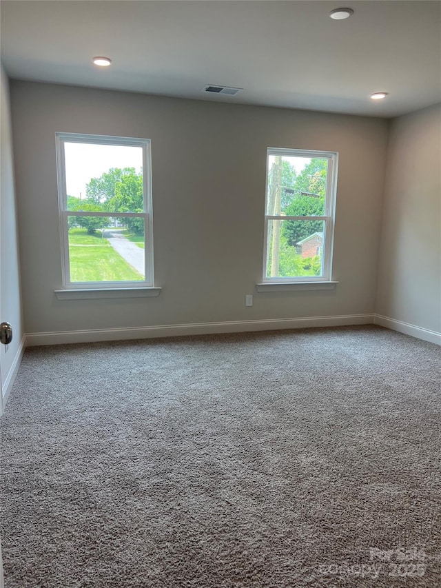 242 N Ave, Troutman, NC 28166 - spare room with carpet, baseboards, and recessed lighting