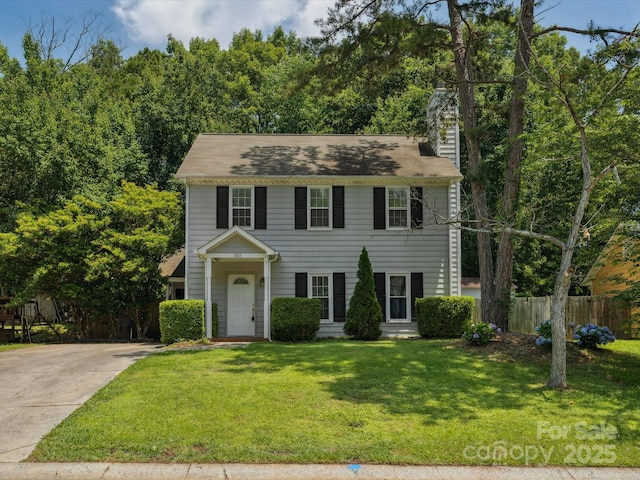 3313 Fortis Ln, Matthews, NC 28105 - colonial house with a chimney and concrete driveway