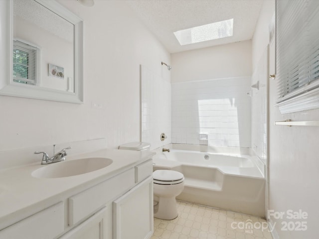 3313 Fortis Ln, Matthews, NC 28105 - bathroom featuring a skylight, toilet, shower / bathtub combination, vanity, and healthy amount of natural light