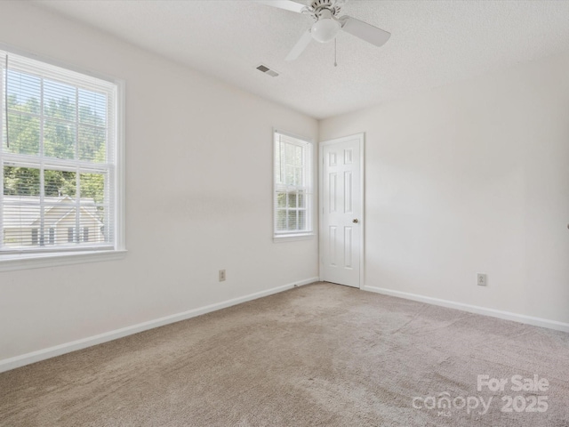 3313 Fortis Ln, Matthews, NC 28105 - carpeted spare room with healthy amount of natural light, baseboards, and a ceiling fan