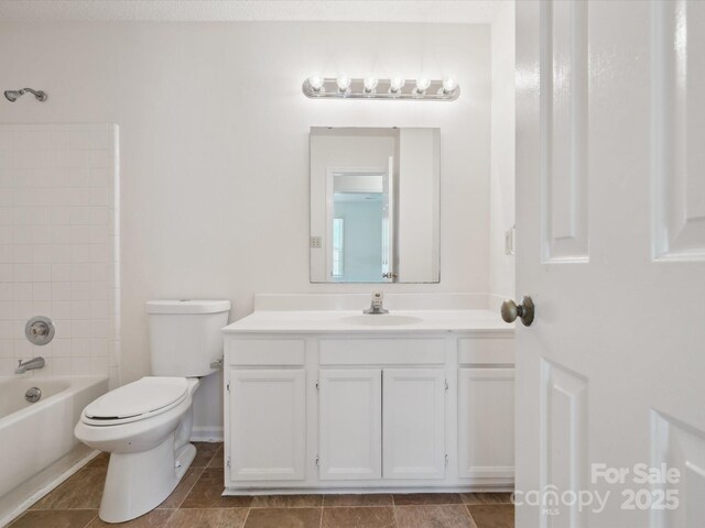 3313 Fortis Ln, Matthews, NC 28105 - bathroom featuring vanity, toilet, and washtub / shower combination