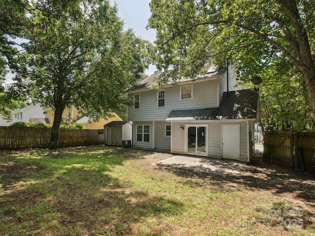 3313 Fortis Ln, Matthews, NC 28105 - rear view of property featuring a patio area and a chimney