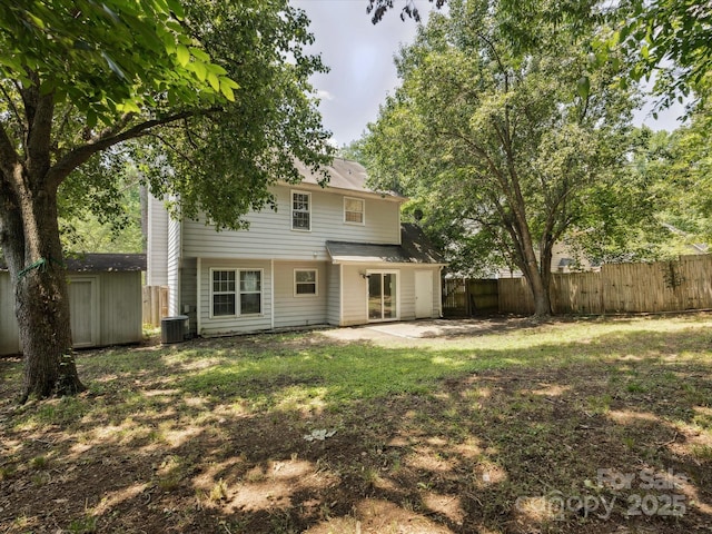3313 Fortis Ln, Matthews, NC 28105 - rear view of house featuring a fenced backyard, cooling unit, and a patio