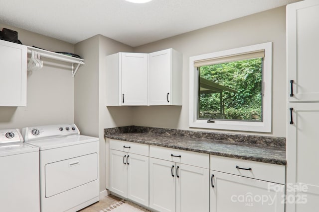 44 Falls Creek Rd, Pisgah Forest, NC 28768 - laundry area featuring cabinet space and washing machine and dryer