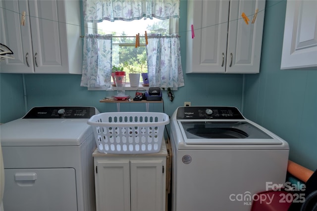 252 Chuckwood Rd, Mooresville, NC 28117 - laundry room featuring washer and clothes dryer and cabinet space