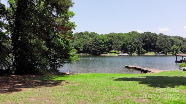 252 Chuckwood Rd, Mooresville, NC 28117 - dock with a water view, a lawn, and a forest view