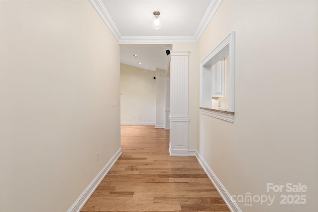 5601 Fairview Rd Unit 11, Charlotte, NC 28209 - hallway with ornamental molding, light wood-style floors, and baseboards