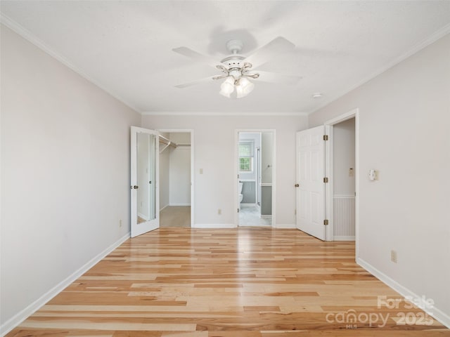 321 Jupiter Rd, Weaverville, NC 28787 - spare room featuring ceiling fan, light wood-style flooring, crown molding, baseboards, and a smoke detector