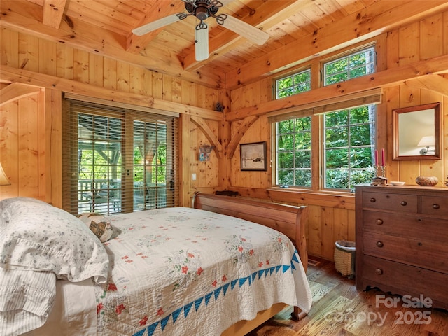 151 Sanctuary Dr, Burnsville, NC 28714 - bedroom featuring wooden ceiling with exposed beams, wood finished floors, wood walls, access to outside, and ceiling fan