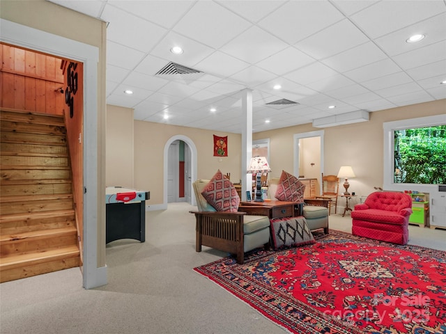 151 Sanctuary Dr, Burnsville, NC 28714 - living room featuring carpet, stairway, arched walkways, and recessed lighting