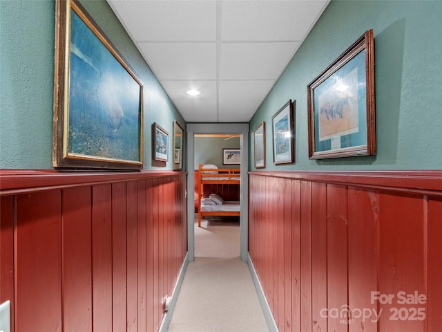 151 Sanctuary Dr, Burnsville, NC 28714 - hallway with a wainscoted wall, wooden walls, and a paneled ceiling