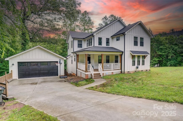 1062 Willow Ridge Ln, Fort Mill, SC 29707 - modern inspired farmhouse with a porch, board and batten siding, a detached garage, a front lawn, and roof with shingles