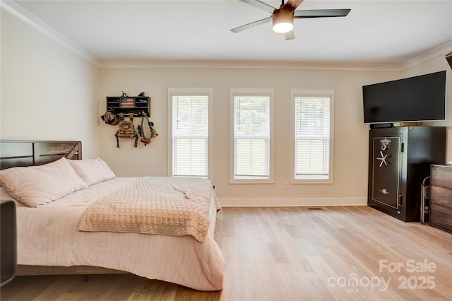 1062 Willow Ridge Ln, Fort Mill, SC 29707 - bedroom featuring light wood-type flooring, ornamental molding, baseboards, and a ceiling fan