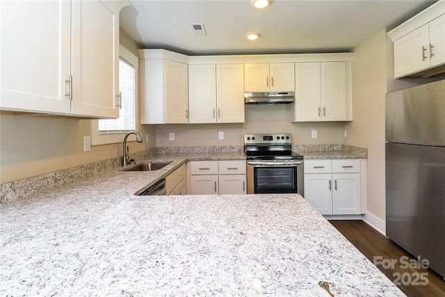 515 Kings Mountain St, Clover, SC 29710 - kitchen featuring appliances with stainless steel finishes, a sink, under cabinet range hood, light stone counters, and recessed lighting