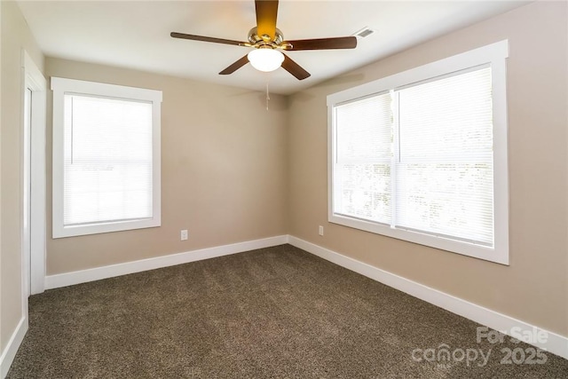 515 Kings Mountain St, Clover, SC 29710 - unfurnished room featuring dark colored carpet, baseboards, and a ceiling fan