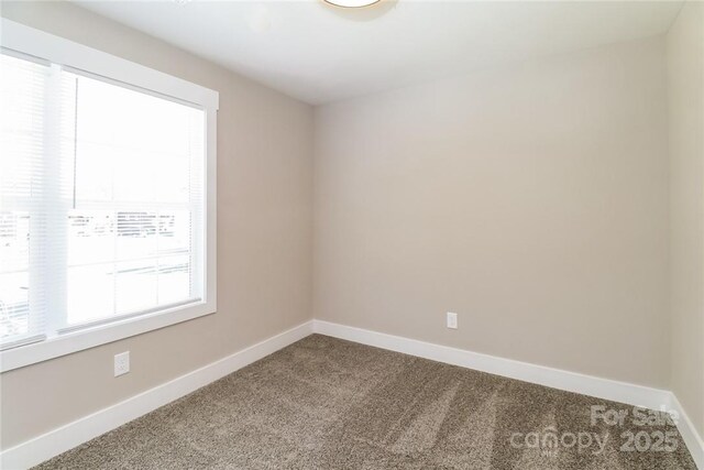 515 Kings Mountain St, Clover, SC 29710 - carpeted empty room featuring baseboards