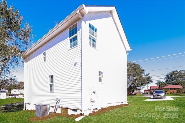 515 Kings Mountain St, Clover, SC 29710 - view of property exterior with crawl space, central AC unit, and a yard
