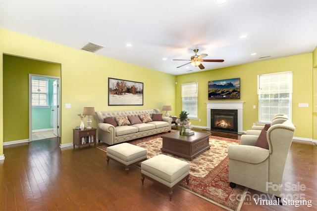 10105 Community House Rd, Charlotte, NC 28277 - living room featuring a ceiling fan, a glass covered fireplace, wood finished floors, and recessed lighting