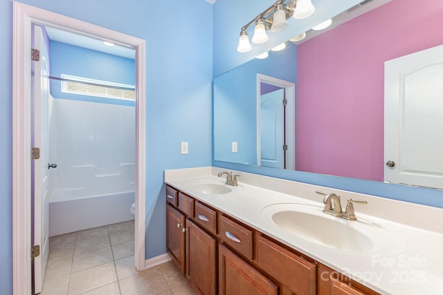 10105 Community House Rd, Charlotte, NC 28277 - bathroom featuring double vanity, tile patterned floors, and washtub / shower combination