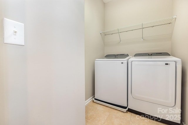 10105 Community House Rd, Charlotte, NC 28277 - laundry room featuring washing machine and clothes dryer and light tile patterned flooring