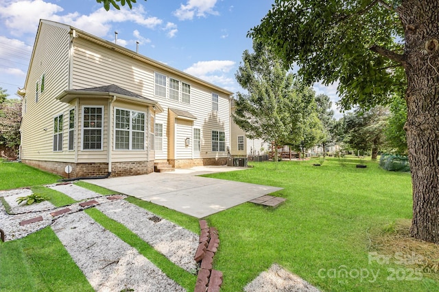 10105 Community House Rd, Charlotte, NC 28277 - rear view of property featuring a patio and a yard