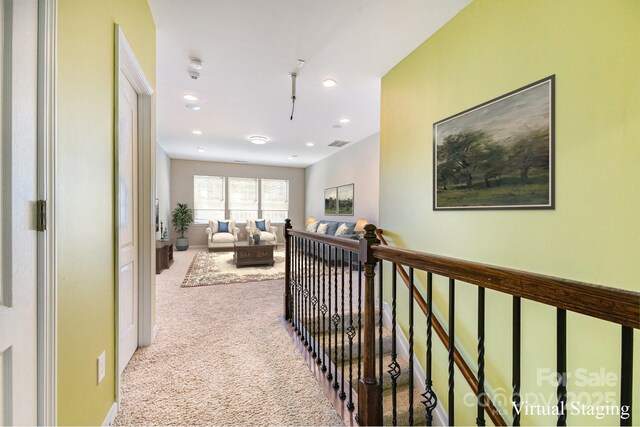 10105 Community House Rd, Charlotte, NC 28277 - hallway with carpet floors, an upstairs landing, and recessed lighting