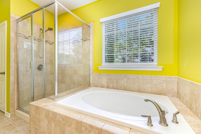 10105 Community House Rd, Charlotte, NC 28277 - bathroom featuring a shower stall, a garden tub, and tile patterned flooring