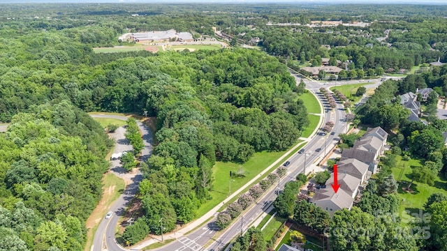 10105 Community House Rd, Charlotte, NC 28277 - aerial view of property and surrounding area featuring a heavily wooded area